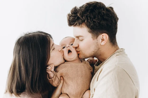 Happy Mothers day and Happy Fathers day! Happy couple kissing li