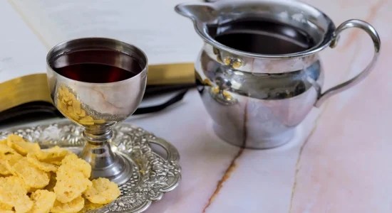 An overview of Christian Holy Communion that includes unleavened bread chalice wine other symbols associated with Jesus Christ